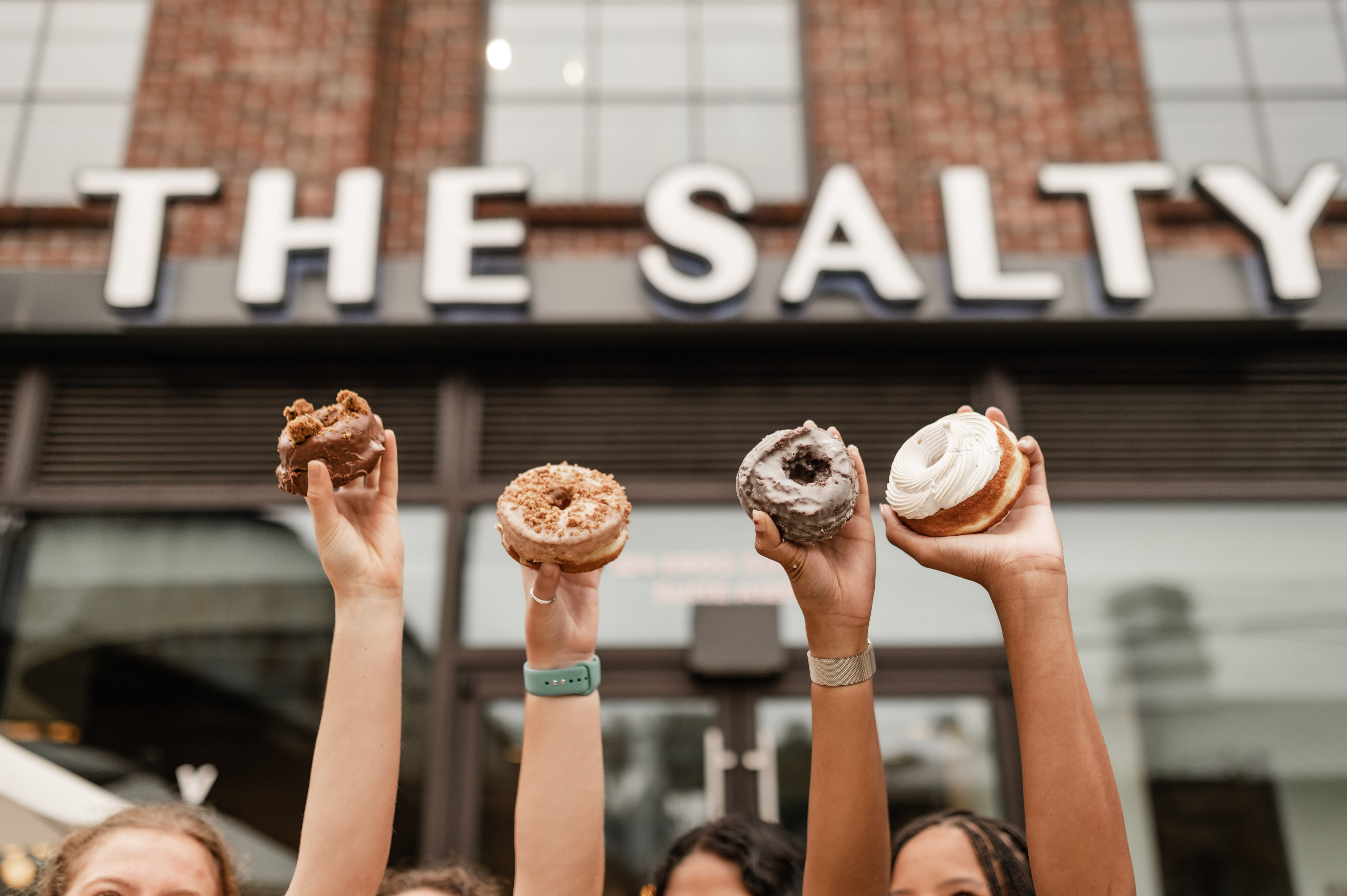 Georgia Tech students with donuts from The Salty near Rambler Atlanta in Midtown Atlanta