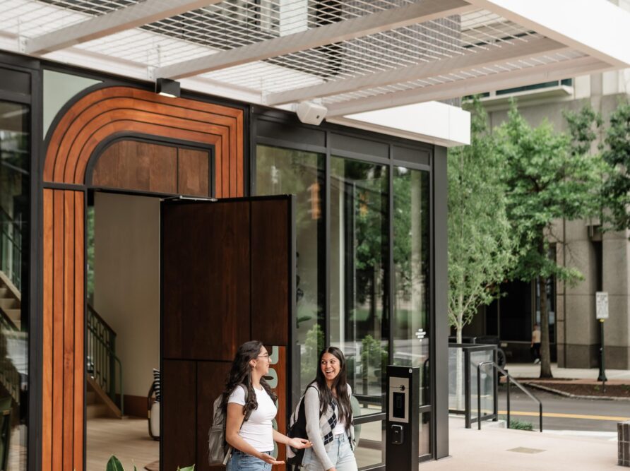 rambler atlanta walking front entrance exterior outside two girls