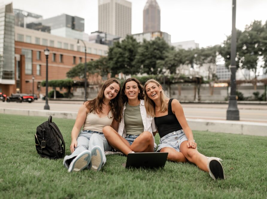 Three girls in Atlanta with a laptop