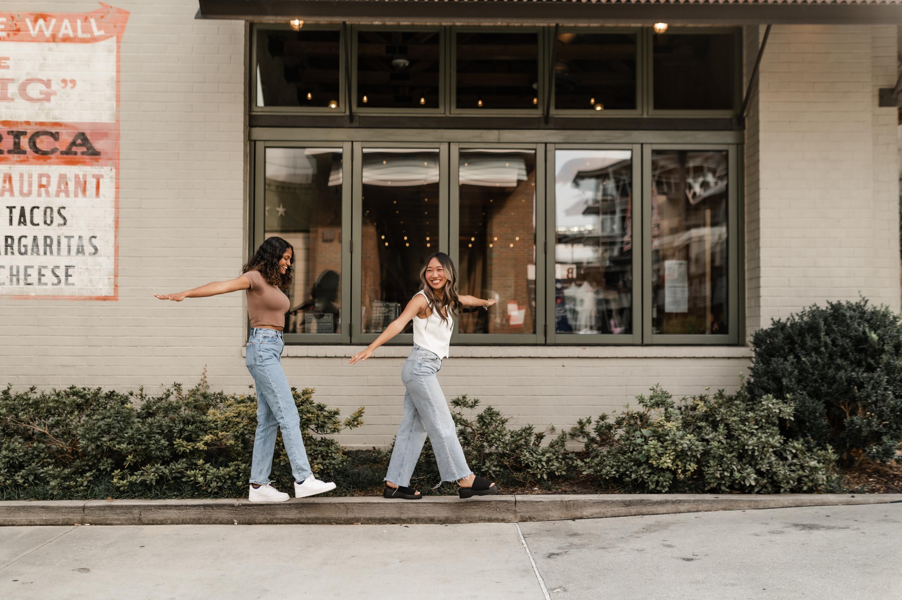 Girls Playing Around on Sidewalk