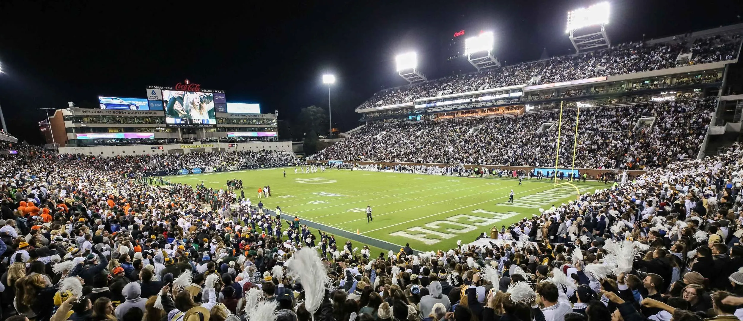 Georgia Tech students watching Yellow Jacket football in Bobby Dodd Stadium 