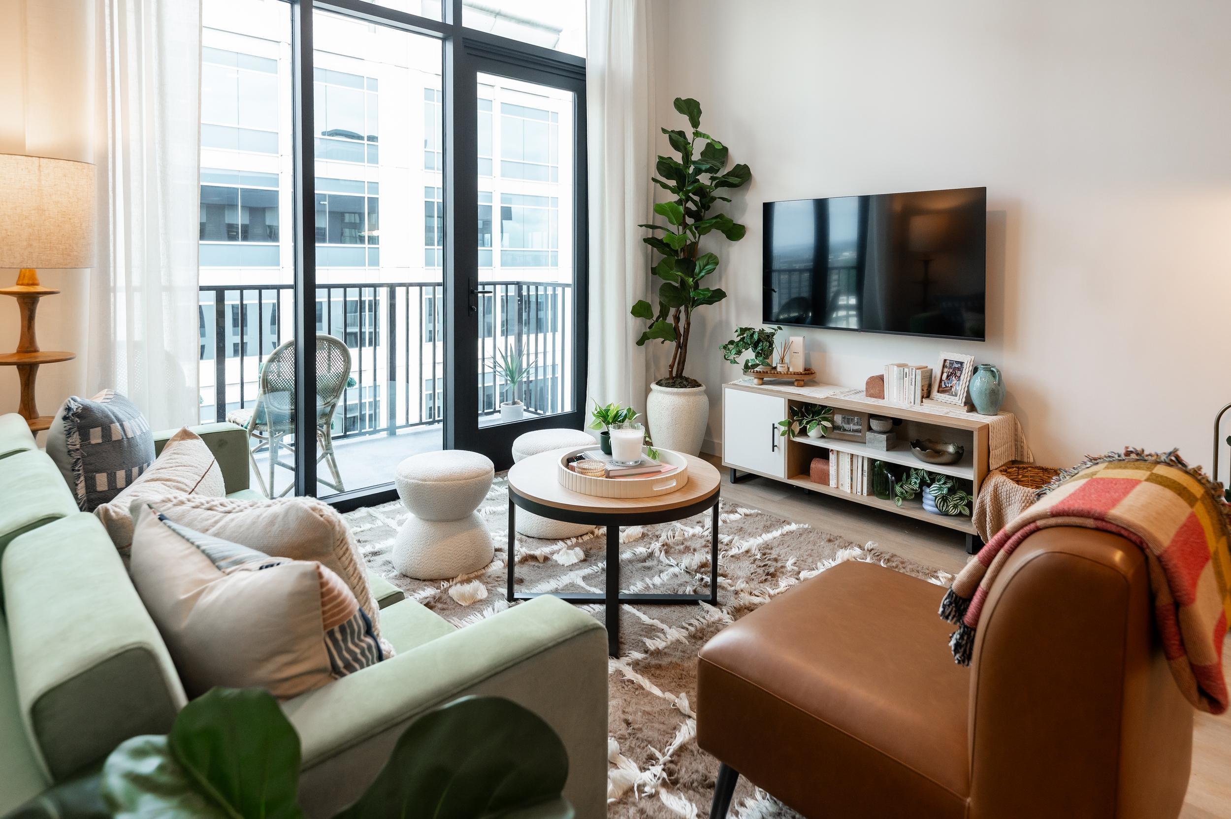 Representative living room featuring Rambler's standard furniture and finishes.